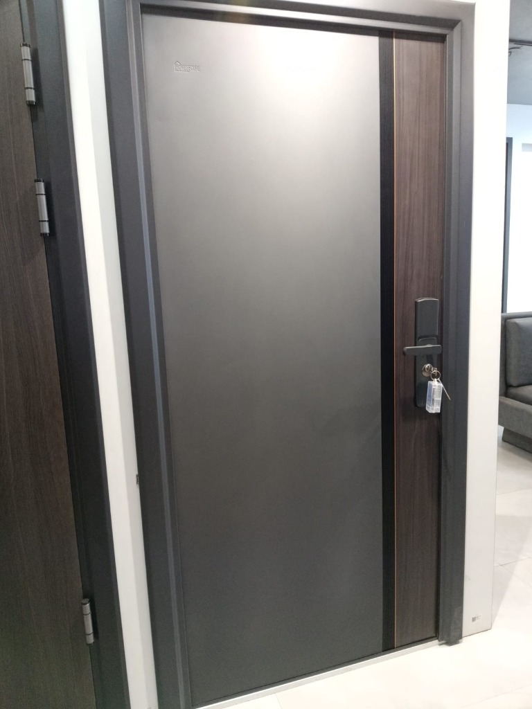 Ornamental steel double door with bronze mandala detailing